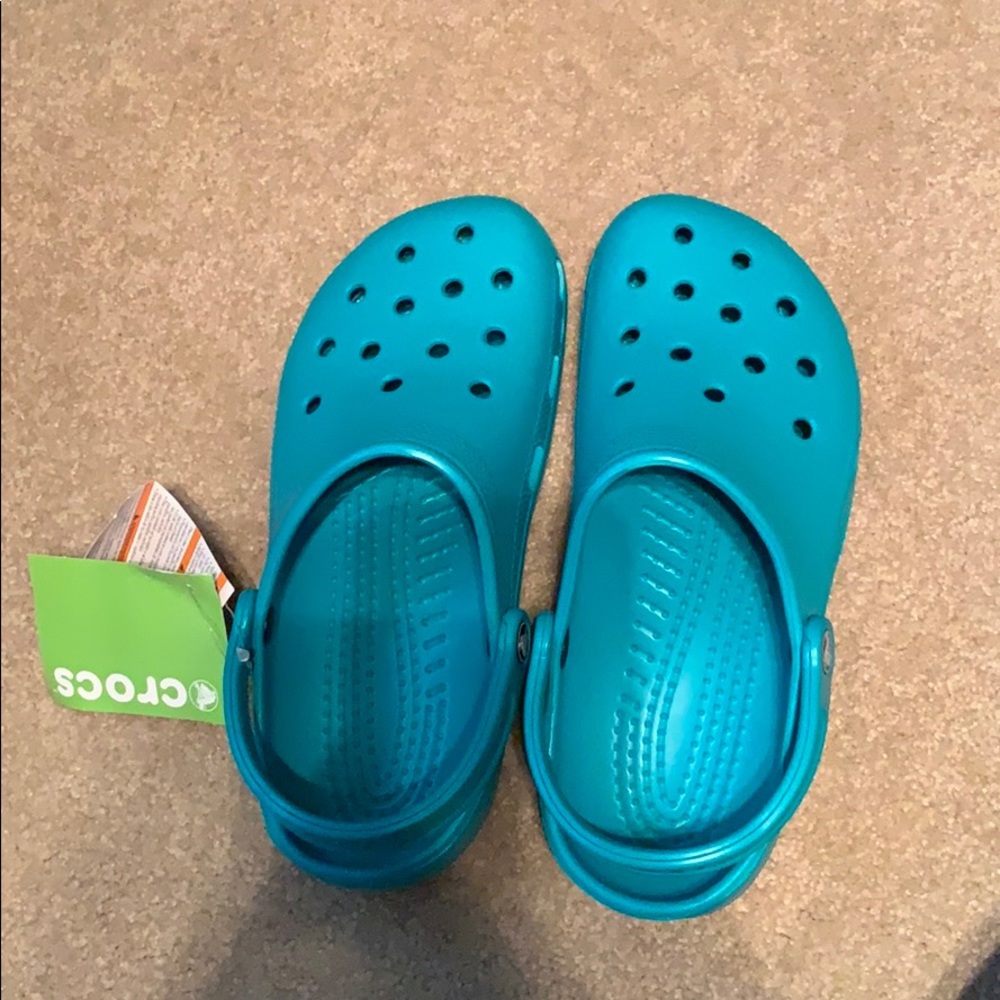 Teal crocs
